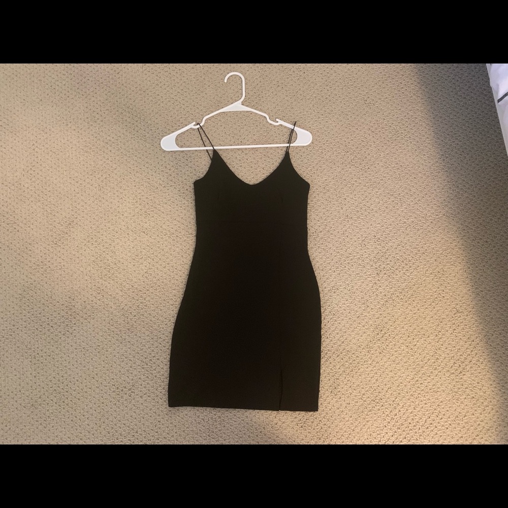 black bodycon dress with thigh slit